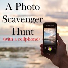 a person holding up a cell phone with the caption, a photo scavenger hunt with a celphone