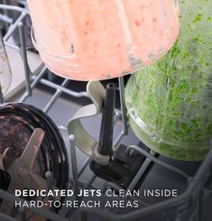 a dishwasher filled with dirty dishes next to a lamp and other items that have been washed