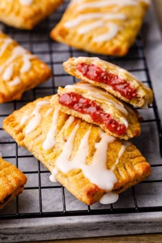 several pastries on a cooling rack with icing