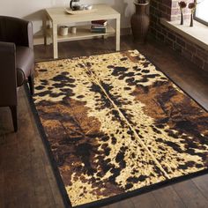 a brown and black area rug in a living room