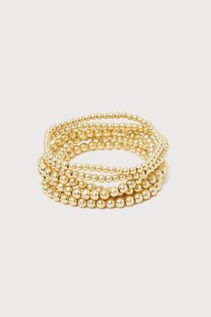 Add a little extra shine to all your most iconic looks when you pair them with the Lulus Glamorously Gorgeous Gold Beaded Six-Piece Bracelet Set! This decadent set of six bracelets has stretchy, elastic bands that boasts beaded designs in a variety of sizes, for a versatile set you'll wear again and again! Bracelet set measures 2. 5" in diameter. Man Made Materials. Imported. Lulus | Glamorously Gorgeous Gold Beaded Six-Piece Bracelet Set. Gold Bead Bracelet, Beaded Designs, Iconic Looks, Lulu Fashion, Gold Bead Bracelets, Personal Marketing, Bead Bracelet, Gold Beads, Bracelet Set