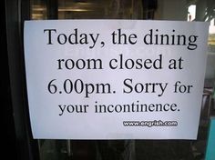 a sign posted on the door of a restaurant stating that it is closed for business