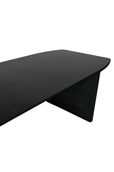 a large black table sitting on top of a white floor