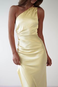 Highlights Gorgeous satin maxi Open back detail Ruched waist Available in Olive, Pink, Lemon & Blue Sizing The model is 5'10 and wears UK size 8 / S / US size 4 Fit & Fabric Made from 100% polyester Rear zip Not lined True to size Length from neck to hem: 144cm Stretch: 4/10 Perfect for Communions & Confirmations Wedding guest Christenings Lemon Bridesmaid Dresses, Blue And Yellow Dress, Yellow Long Dress, Silk Bridesmaid Dresses, White Bridal Dresses, Yellow Bridesmaid Dresses, Maxi Dress Wedding Guest, White Bridesmaid Dresses, Pastel Dress