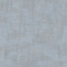 a gray background that looks like it is made out of paper or fabric with some sort of texture