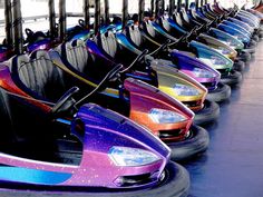 colorful bumper cars lined up in a row