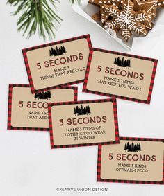 five tags with the words 5 seconds are placed next to some cookies and fir trees