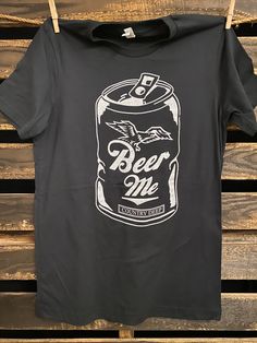 Country Deep Beer Me unisex T shirt Who doesn't need a beer every now, and then? This soft Beer me black t-shirt will let everyone know, your thirsty, and ready for a cold one. Tri blend crew T shirt 4.3 oz. 50% Poly/25% Cotton/25%Rayon Beer Tshirt Design Ideas, Beer Slogans, Beer T Shirt Design, Bar Shirts, Beer Shirts Men, Beer T-shirts, Vintage Beer Shirts, Bar Shirt, Beer Art