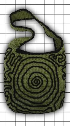 a crocheted bag with an intricate design on it