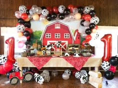 a farm themed birthday party with balloons and decorations