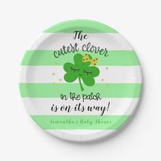 a st patrick's day paper plate with a shamrock on it that says, the cutest clover in the patch is on its way