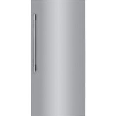 a silver refrigerator freezer sitting on top of a white wall