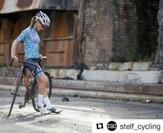 a person riding a bike on the street