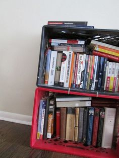 a red suitcase filled with lots of books