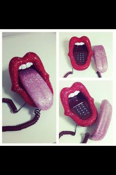 a cell phone that is in the shape of a mouth with teeth and tongue attached to it