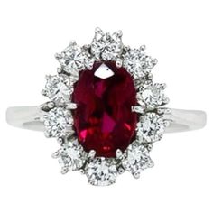 This 18K white gold stunning ring is from our Timeless Collection. It is made of a beautiful oval shape ruby in total of 1.52 Carat decorated by 10 natural colorless round shape diamonds in total of 0.68 Carat. Total metal weight is 4.70 gr. Extraordinary piece for any occasion! The Timeless Collection was inspired by the endless elegance and sophistication of classic high-jewelry, eternising it’s beauty and presenting a selection of classy designs. The intense colours stones give the collection Luxury Oval Ruby Diamond Ring, Oval Ruby Jewelry With Brilliant Cut For Weddings, Gia Certified Oval Ruby Ring, Luxury Ruby Ring With Oval Center Stone, Luxury Oval Ruby Ring With Center Stone, Luxury Oval Ruby Birthstone Ring, Luxury Oval Ruby Ring With Prong Setting, Luxury Oval Ruby Ring For Anniversary, Timeless Oval Ruby Ring With Diamonds