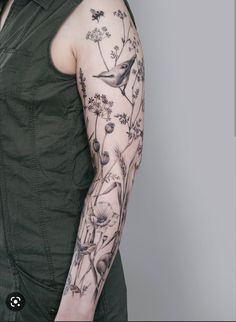 a woman with a tattoo on her arm