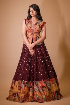 Maroon lehenga featuring hand-painted kalamkari border with embroidered glass beads. Paired with a padded peplum blouse showcasing cream ajantha work and pleat detailing., Fit: Relaxed Kids Net Frock, Navratri Collection 2023, Saree Into Dress, Latest Dress Patterns, Peplum Blouse Pattern, Narayanpet Long Frocks, Kalamkari Lehenga, Kalamkari Border, Kids Dress Design