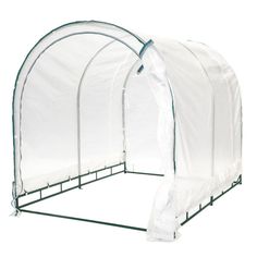 a large white greenhouse with two sides closed and one side opened to show the inside