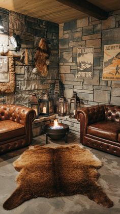 a living room filled with brown leather furniture and walls covered in stone wallpapers