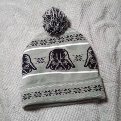 a knitted hat with star wars on it