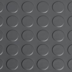 an image of a metal surface with circles on it