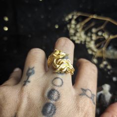 Nine Tailed Fox Sterling Silver Adjustable Ring with Citrine now in gold plated! Nine-Tailed Fox or húli jīng or kyuubi no kitsune, is a messenger of the Gods and Goddesses. The Celestial Nine-Tailed Fox lives in the Palace of the Sun and Moon, and there is saying 'Where there is no fox demon, no village can be established.' It is also believed that if a Kitsune has more tails, it is stronger and wiser. Original design of Nine-tailed fox ring with faceted teardrop citrine. Material: full sterling silver 925 gold plated. Adjustable size (USA Size 6-8). Please bear in mind that photo may slightly different from actual item in terms of color due to the lighting during photo shooting or the monitor's display. Please note that this is gold plated ring, eventually the gold plated will wear off Gold Fantasy Jewelry With Dragon Design, Fantasy Gold Jewelry With Dragon Design, Mystical Gold Ring Jewelry, Fox Goddess, Fox Demon, Fox Ring, Nine Tailed Fox, Fandom Fashion, Plated Ring