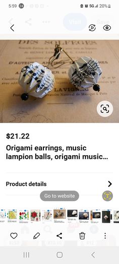 an image of a pair of origami balls on a table with the caption below it