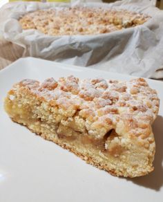 a piece of pie sitting on top of a white plate