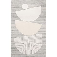 an abstract rug with white and grey shapes