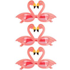 three pink flamingos in the shape of hearts