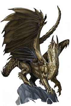 a golden dragon sitting on top of a rock with its wings spread out and it's eyes open