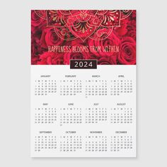 a 2013 calendar with red roses on it and the words happiness blooms from within them