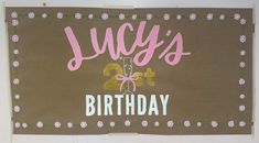 a brown birthday sign with pink flowers and the words juicy's 21st on it