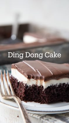 a piece of chocolate cake on a plate with the words ding dong cake above it