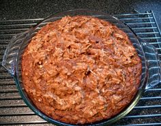 a cake sitting on top of a cooling rack