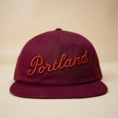 A premium cotton, unstructured, pinch front 5 panel, flat bill, with a premium leather strap with brass clasp. Designed and decorated in Oregon with 3D embroidery. Maroon Hat, Flat Bill Hats, Casual Outfits Summer, Mens Casual Outfits Summer, Shop Inspiration, Billie Jean, 3d Embroidery, Promo Items, Hat Design