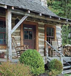 a log cabin with steps leading up to it