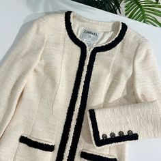 Authentic Rare Vintage Chanel Cream Tweed Longline Jacket With Contrasting Black Trim, Two Front Pockets, Concealed Zip Front Closure And Euro Buttons. 2002 Spring Collection. Size 40. In Fantastic Condition, Minimal Signs Of Wear. Chanel Jacket Trims, Coat Inspiration, Chanel Cream, Chanel Jackets, Longline Jacket, Chanel Jacket, Button Jacket, Vintage Chanel, Jacket Buttons