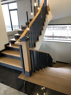 the stairs are made of wood and metal