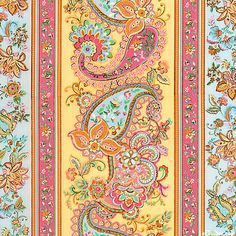 an ornate paisley design on blue and yellow fabric