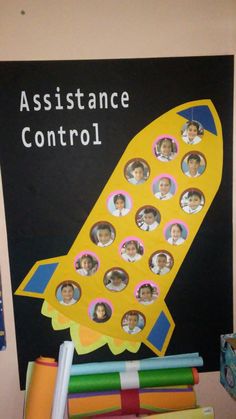 a bulletin board with pictures of people in a rocket ship on it and the words assistance for assistance