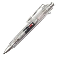 a pen that is sitting on top of a white surface with a red light in it