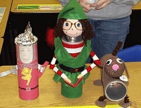 a person standing next to some toys on a table