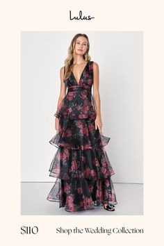 You'll be an utterly entrancing sight to see when you step out in the Lulus Garden Radiance Black Floral Print Organza Tiered Maxi Dress! Airy woven organza, with a romantic red and green floral print throughout, shapes this romantic dress that features a deep V-neckline and a pleated, sleeveless bodice. High, banded waist sits atop a cascading, tiered skirt that falls to an elegant maxi hem. V-back creates an extra-alluring final finish! Hidden back zipper/clasp. Fit: This garment runs small - Black Flowy Floral Maxi Dress, Black Printed Floor-length Dress, Black Bridesmaid Dresses Bright Florals, Black Floral Print Backless Maxi Dress, Black Floral Print Floor-length Gown, Black Tie Attire, Green Floral Print, Black Floral Print, Wedding Vision