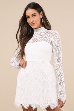 Let everyone know you're the cutest in the room when you arrive in the Lulus Gorgeous Attraction White Lace Structured Long Sleeve Mini Dress! Romantic sheer lace shapes this stunning dress that has long sleeves (with eyelash lace trim) and a mock neckline with loop button closures at back. Sheer decolletage tops a darted bodice with hidden no-slip strips and a fitted waist. Skirt has a chic, structured design (with a reinforced tulle underlayer) as it falls to an eyelash lace mini hem. Hidden z White Mini Dress With Lace Sleeves, Chic White Mini Dress With Lace Sleeves, Embroidered White Long Sleeve Mini Dress, White Lace Mini Dress Long Sleeve, White Sheer Long Sleeve Mini Dress, Mini Dress Lace, White Lace Mini Dress, Structured Dress, Structured Design