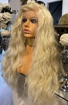 Bleach blonde - 613 stunning unit. BEAUTIFUL BLEACH BLONDE UNIT FREE - WIG CAP FREE - CELEBRITY HAIR UK STORAGE PACKAGE Be the centre of ATTENTION - This unit is GORGEOUS!! CENTRE part UNIT EXACT unit and the pics are of the actual wig you will receive. Yellow undertone - 613 Human hair blend - which is human hair blended with synthetic hair. Hand tied knots with natural centre part lace hairline Light weight Centre part Can be styled with heat Combs for added comfort Adjustable straps Beautiful wig, very soft and lightweight. Our wigs have been carefully made/selected or customised in the style of A-Listers around the world. You would be hugely surprised at how many celebrities are wearing wigs at the moment rather than damage their hair with colouring and heat. Why not join them and give Wearing Wigs, Free Wig, How To Wear A Wig, Celebrity Hair, Beautiful Wigs, Bleach Blonde, Mild Shampoo, Brown Wig, Blonde Wig