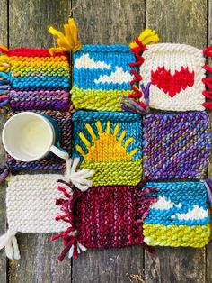 knitted placemats on wooden table with cup and saucer in the middle