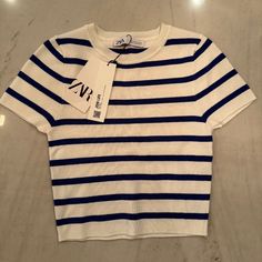 Knit White With Blue Stripe Crop Top. In Excellent Condition, With Tags, And Extremely Comfortable. Very Lightweight And Easy For A Casual Night Out. Knitted Shirts, Zara White Casual Knit Top, Zara Blue Summer Tops, Casual Blue Zara Tops, Trendy Blue Zara Crop Top, Zara Striped Knit Tops, Zara Striped V-neck Tops, Zara T Shirt, Casual Night Out