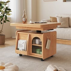 a living room with a couch, coffee table and bookshelf